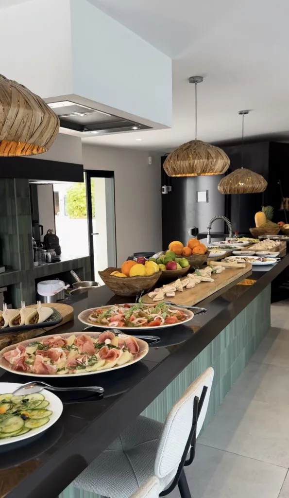 Authentic Spanish paella night setup with sangria and tapas at Marbella villa terrace